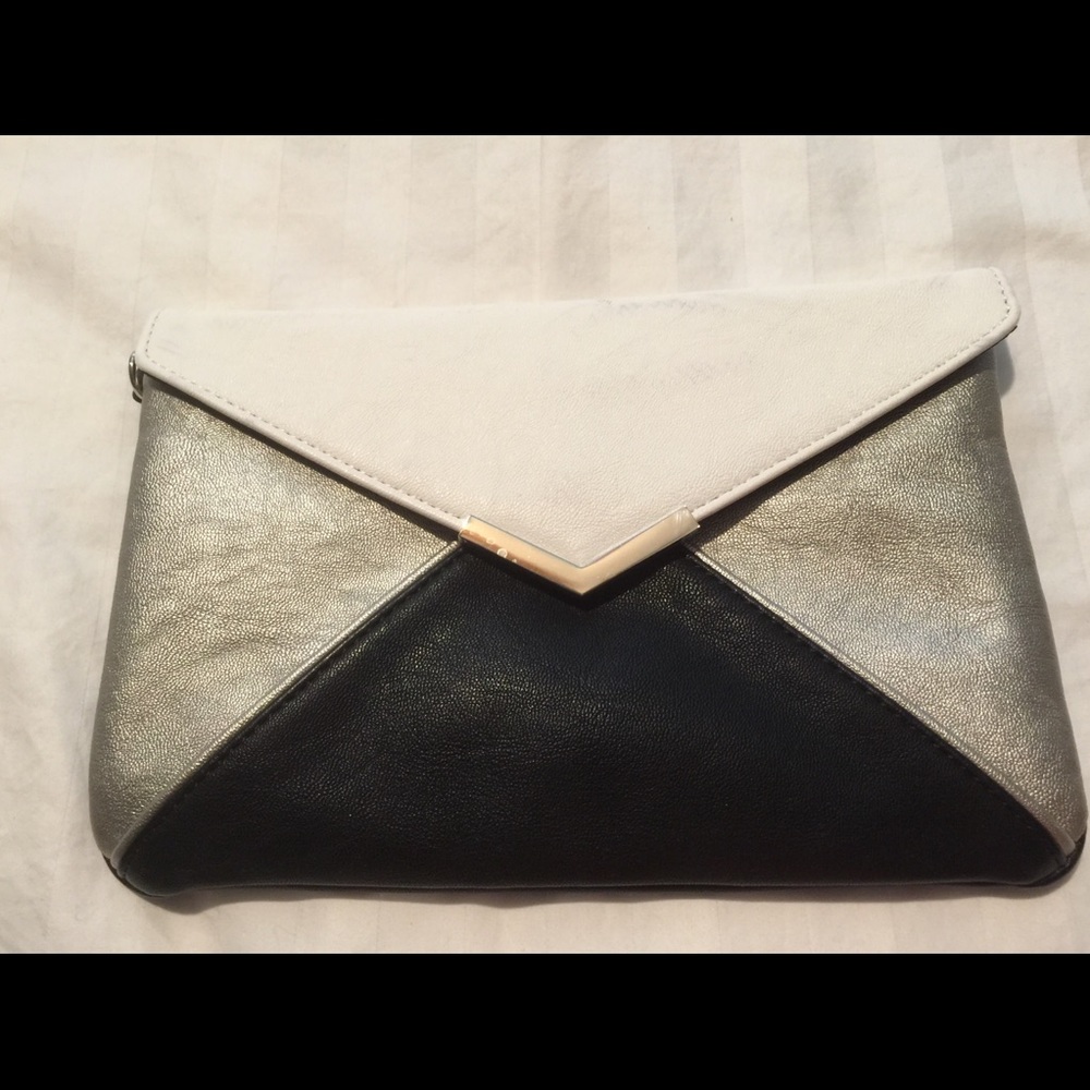 Clutch, multi color. Black, white, silver.